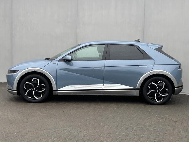 Hyundai IONIQ 5 Lounge 77.4 kWh Automaat 228pk / Accu SOH 100% / Fabrieksgarantie tot 12-2027 / WLTP 507 km / CCS snellader / Head Up Display / warmtepomp / Trekgewicht 1600 kg / Stuur-, Stoel & Achterbank verwarming / 8 jaar Batterij Garantie /