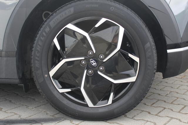 Hyundai IONIQ 5 Connect AWD 77.4 kWh | Incl. 12 Maanden garantie | Trekhaak | Adaptieve Cruise | Climate Control | Apple Carplay/Android Auto | Stoelverwarming | Stuurverwarming | Elektrische voorstoel | Parkeersensoren | Parkeercamera |