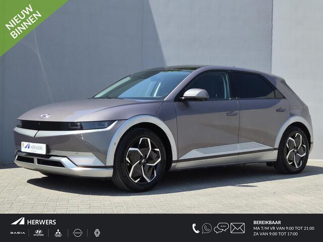 Hyundai IONIQ 5 Lounge 73kWh / SOH 100% / SOLAR dak / Fabrieksgarantie tot 05-2027 / Dealer onderhouden / Head Up Display / CCS snelladen / Warmtepomp / Trekgewicht 1600 kg / Stuur- Stoel & Achterbank verwarming / Rondomzicht camera / Bose Audio Systeem /