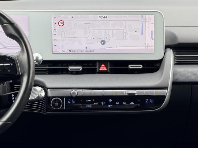 Hyundai IONIQ 5 Connect 77.4 kWh / Volledig LED / Stoelverwarming Voor + Achter / Stuurverwarming / Dynamische Navigatie / Achteruitrijcamera / Elek. Bedienbare Voorstoelen / Climate Control / Parkeersensoren Voor + Achter /