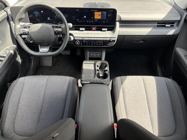 Hyundai IONIQ 5 Connect+ 84 kWh / Fabrieksgarantie tot 03-2030 / SOH 99,1% / Stoel en stuurverwarming / Elektrische voorstoelen / Navigatie / Appel carplay / Android auto / Achteruitrijcamera / Rondom sensoren /