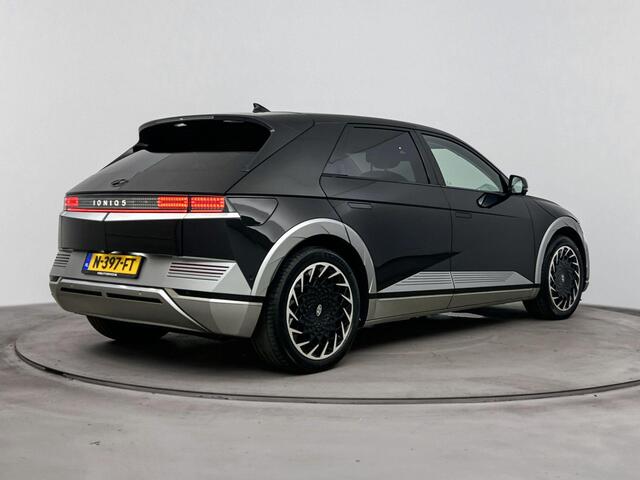 Hyundai IONIQ 5 Lounge 73kWh | SOH 92.9% | Elektrische stoelen | Afneembare trekhaak | Achteruitrij camera | Navigatie | Dodehoek detectie |