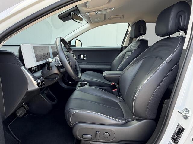 Hyundai IONIQ 5 Connect + 77.4 kWh met aanvullende optie's / SOH 100% / Dealer Onderhouden / WLTP 507 km / CCS Snel Laden / Lederen Bekleding / Stoelventilatie / Elektr. Voorstoelen / Stuur-, Stoel- & Achterbankverwarming / Navi / Apple Carplay & Android Auto / 19" LM wielen /