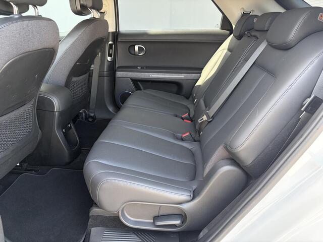 Hyundai IONIQ 5 Connect + 77.4 kWh met aanvullende optie's / SOH 100% / Dealer Onderhouden / WLTP 507 km / CCS Snel Laden / Lederen Bekleding / Stoelventilatie / Elektr. Voorstoelen / Stuur-, Stoel- & Achterbankverwarming / Navi / Apple Carplay & Android Auto / 19" LM wielen /