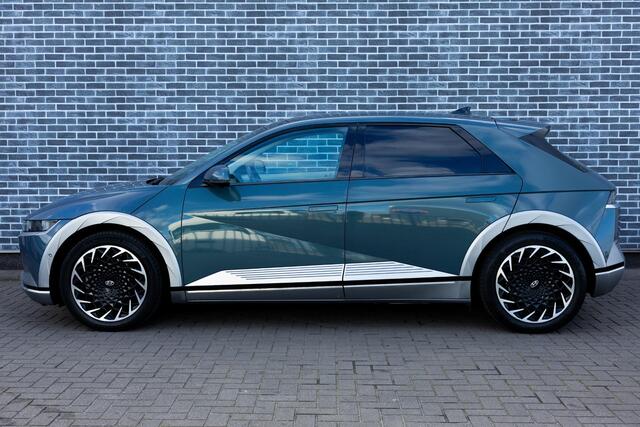 Hyundai IONIQ 5 Lounge 73kWh | Trekhaak | Warmtepomp | Panoramadak | 360 Graden Camera | Lederen Bekleding | Stoelventilatie | Stoelverwarming voor en achter | Keyless Entry | Elektrische Achterklep | Cruise Control Adaptief | Dodehoekdetectie | Navigatie | Apple Carplay | Android Auto