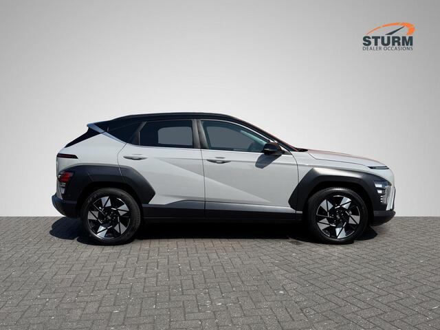 Hyundai Kona 1.6 GDI HEV Premium | Two-Tone Lakkleur | Stoelverwarming + -Ventilatie | 360° Camera | Leder | Navigatie | Apple Carplay/Android Auto | Geheugenstoel | Rijklaarprijs!