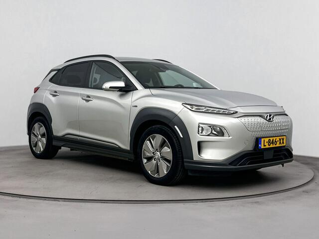 Hyundai Kona EV Fashion 64 kWh | Warmte pomp | Navigatie | Dodehoek detectie | Parkeersensor achter | Apple Carplay Android Auto |