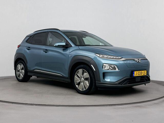 Hyundai Kona EV Fashion 64 kWh | Stoelverwarming | Parkeersensoren achter | Soh 96% | Navigatie |