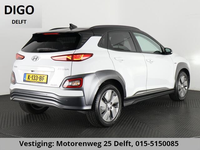 Hyundai Kona PRIMIUM EV 64 KWH 1e EIG ACCU 92% GARANTIE 10-2030 BEREIK 466 KM ! LEDER. STUUR/STOEL VERWARMING.DODE HOEK DETECTIE
