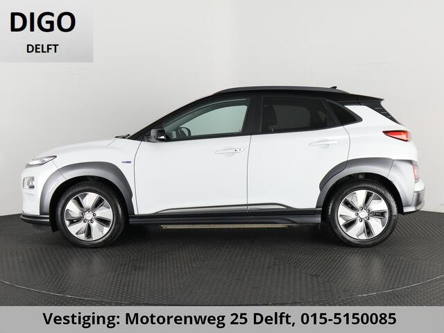 Hyundai Kona PRIMIUM EV 64 KWH 1e EIG ACCU 92% GARANTIE 10-2030 BEREIK 466 KM ! LEDER. STUUR/STOEL VERWARMING.DODE HOEK DETECTIE