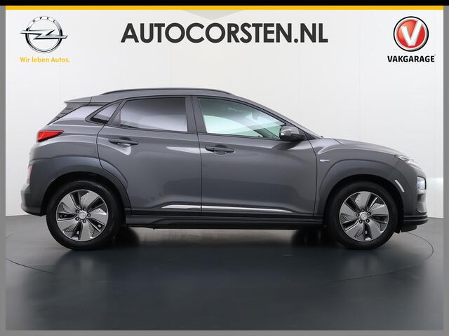 Hyundai Kona EV Premium 64kWh Leer SOH 100% Warmtepomp Krell®-Premium Audio Stoelverwarming+Koeling Camera Apple Carplay Android Auto Head-Up Display Stuurverwarming Elek.Stoelen Blind Spot Lane Assist VESS 1e Eigenaar Origineel Nederlandse Auto 45.000,-nieuw