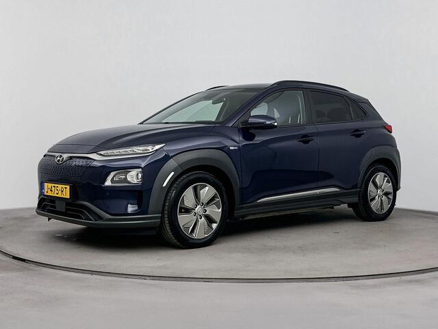 Hyundai Kona EV Premium 64 kWh | Soh 96,5 % | Navigatie, Apple car play Android auto| stoel verwarming en koeling |
