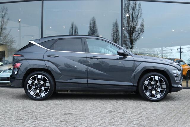 Hyundai Kona ELECTRIC PREMIUM 65.4 kWh | LEDER | TREKHAAK | HUD | 360 CAMERA | MEMORY | ADAPTIVE CRUISE | STOEL- STUURVERW. | CARPLAY