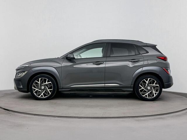 Hyundai Kona 1.6 GDI HEV Premium | Afneembare trekhaak 1300 kg | Navigatie | Parkeer sensoren voor +achter | stoel en stuur verwarming |