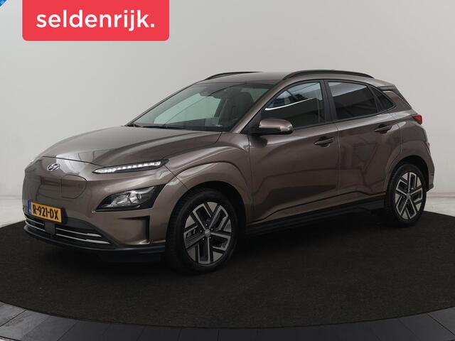 Hyundai Kona EV Fashion 64 kWh | SOH 100% | 3 Fase | Head-Up | Warmtepomp | Adaptive cruise | Camera | Carplay | Keyless | Full LED | Navigatie | Climate control
