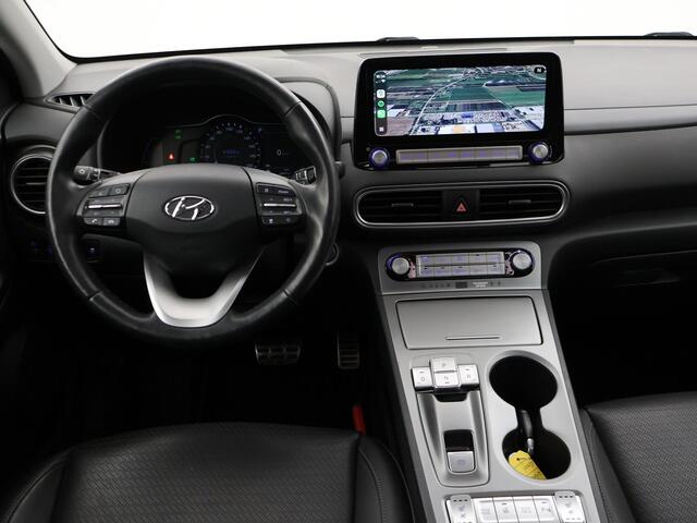Hyundai Kona EV PREMIUM SKY 64 KWH + SCHUIFDAK | LEDER | STOELVENTILATIE | STUURVERW. | STOELVERW.