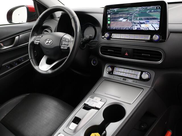 Hyundai Kona EV PREMIUM SKY 64 KWH + SCHUIFDAK | LEDER | STOELVENTILATIE | STUURVERW. | STOELVERW.