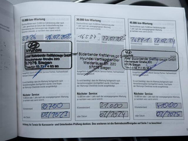 Hyundai Kona EV Comfort Smart 64 kWh / SOH 100% / Afneembare Trekhaak / Warmtepomp / Dealer Onderhouden / Camera / Navigatie Apple Carplay & Android Auto / Adaptieve Cruise Control / Stoel Verwarming / Stuurwiel Verwarming / CCS Snelladen /