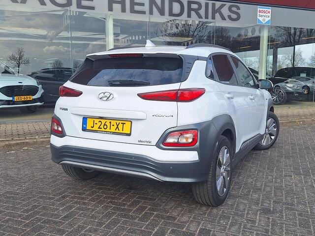 Hyundai Kona EV Fashion 64 kWh | SOH: nnb | 3 Fase | Warmtepomp | HUD | Navi | Adaptive CC | Blindspot |