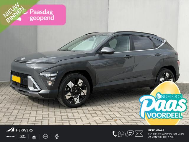 Hyundai Kona 1.6 GDI HEV Comfort Smart Automaat / Fabrieksgarantie tot 1-2030 / Stuur- & Stoel verwarming / Achteruitrijcamera / Apple Carplay Android Auto / Keyless Entry/Start / Adaptief cruise control / Draadloze telefoon lader / Climate control /