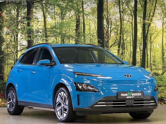 Hyundai Kona EV Comfort Smart 39 kWh | Standkachel | Krell Sound | Camera | Stuurwielverwarming | Stoelverwarming | Lane Assist | Dodehoeksensor | Adaptieve Cruise Control | DAB |