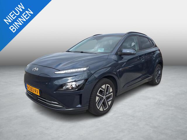 Hyundai Kona EV Fashion 64 kWh | SOH: nnb | 3 Fase | Warmtepomp | Blindspot | Navi | Camera |