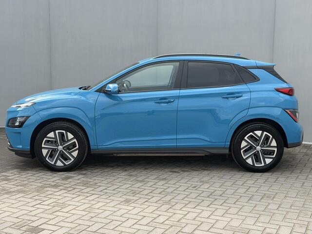 Hyundai Kona EV Comfort 39 kWh / SOH 100% / Dealer Onderhouden / Fabrieksgarantie tot 9-2027 / Navigatie Apple Carplay & Android Auto / Cruise / Clima / Camera / DAB /