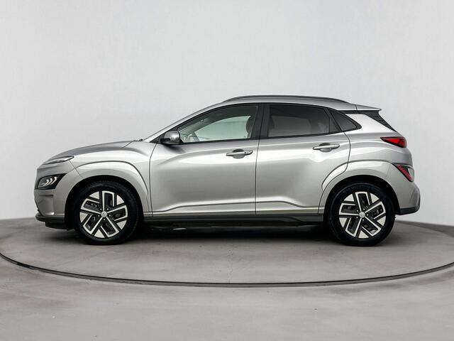 Hyundai Kona EV Fashion 64 kWh | SOH %97.5 | Navigatie | Stoelverwarming | Achteruitrij camera | Apple Carplay/Android Auto | Cruise control |