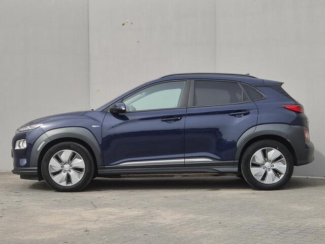 Hyundai Kona EV Fashion 64 kWh / Head Up Display / CCS snelladen / Warmtepomp / Achteruitrijcamera / Apple Carplay Android Auto / Draadloze telefoon lader / Keyless Entry/Start / Navigatie / Krell Audio Systeem / Parkeersensoren achter /