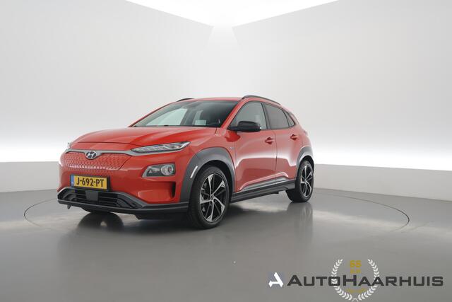 Hyundai Kona EV Premium 64 kWh | |Rijklaar ! |SOH 96.6% | Warmtepomp | HUD | Krell | Adapt. Cruise | Camera | Stoel- Stuurverw. | Keyless | Leder