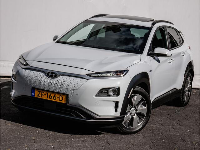 Hyundai Kona EV Premium 64 kWh Warmtepomp/ Stuur+stoelverwarming/ Blindspot/ Schuifdakje/ Camera/ HUD