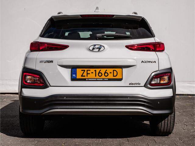 Hyundai Kona EV Premium 64 kWh Warmtepomp/ Stuur+stoelverwarming/ Blindspot/ Schuifdakje/ Camera/ HUD