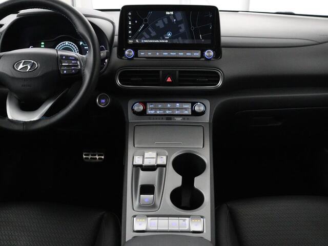 Hyundai Kona EV Fashion Design 64 kWh | SOH 94.6% | Leder | Head-up | Trekhaak | Adaptive cruise | Carplay | Stoelverwarming | Krell Sound | Dodehoek detectie |