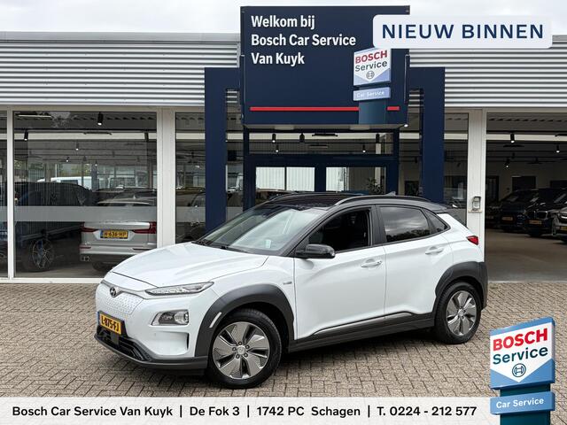 Hyundai Kona EV Premium 64 kWh / 204 PK / Warmtepomp / Apple-Carplay & Android-Auto / Stoelverwarming en -Verkoeling / Stuurverwarming / Adaptieve Cruise-Control / Elektr. Verstelbare-Stoelen / DAB Radio-Bluetooth / Navi / Dodehoek-Detectie / Climate-Control / PDC Camera-Achter / Keyless / 17'' LMV / All-Seasons / ENZ.