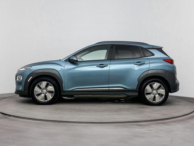 Hyundai Kona EV Fashion 64 kWh | SOH 96.1% | Trekhaak fietsendrager | Achteruitrij camera | Dodehoek detectie | Stoelverwarming |