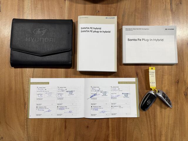 Hyundai SANTA FE 1.6 T-GDI HEV Premium Sky Full Option / Stoelkoeling / Panoramadak / HUD / Memory / Keyless / Afn. Trekhaak / Leder