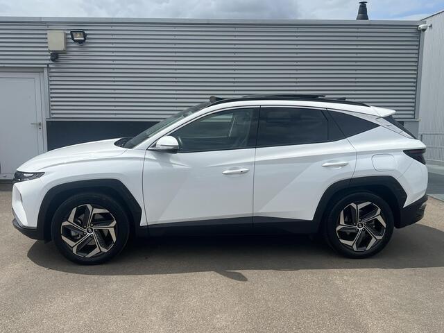 Hyundai TUCSON 1.6 T-GDI PHEV Premium Sky 4WD Schuif/kanteldak, Navigatie, Stoelverwarming, Parkeersensoren voor + Achter, Dodehoekdetectie, Climate control, BTW-Auto