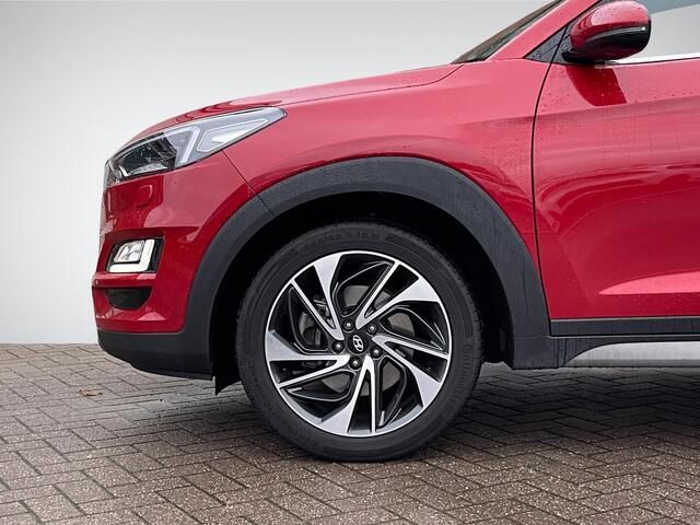 Hyundai TUCSON 1.6 T-GDI 4WD Premium Sky | Trekhaak | Panoramadak | Leder | Navigatie | 360° Camera | Apple Carplay/Anrdoid Auto | Stuur- + Stoelverwarming | Rijklaarprijs!