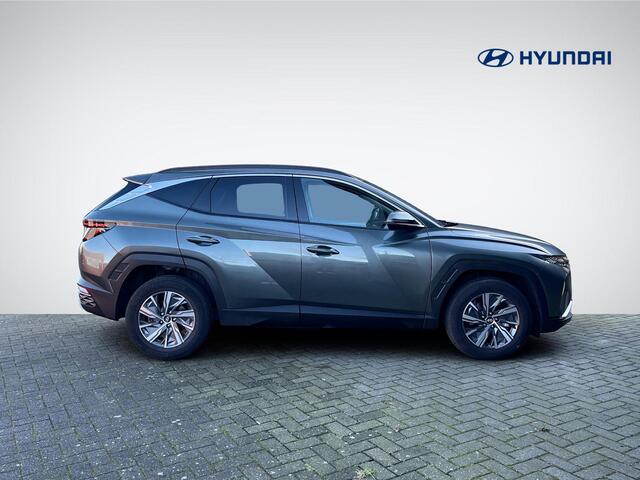Hyundai TUCSON 1.6 T-GDI HEV Comfort Smart | Navigatie | Camera | Stuur- + Stoelverwarming | Elek. Achterklep | Premium Audio | Rijklaarprijs!