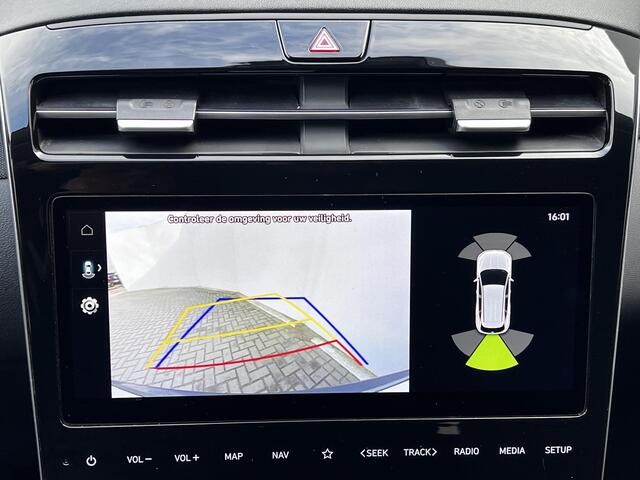 Hyundai TUCSON 1.6 T-GDI HEV 230PK Comfort Smart / 1650kg Trekgewicht / |Elektr. klep / Stuur- en stoelverwarming / Navigatie / Apple Carplay Android / Camera / Adapt. CC / Dode hoek detectie /