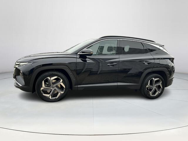 Hyundai TUCSON 1.6 T-GDI HEV Premium | Sportvelgen| Navigatie| Automaat| Apple car play| Trekhaak| All Season banden|