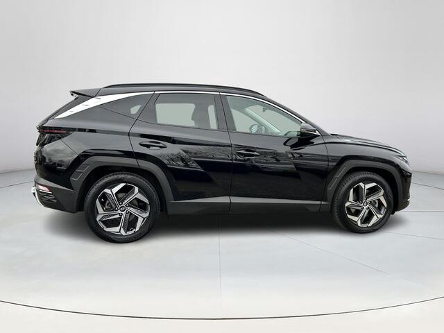 Hyundai TUCSON 1.6 T-GDI HEV Premium | Sportvelgen| Navigatie| Automaat| Apple car play| Trekhaak| All Season banden|