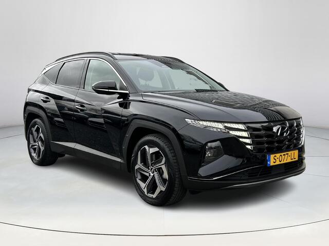 Hyundai TUCSON 1.6 T-GDI HEV Premium | Sportvelgen| Navigatie| Automaat| Apple car play| Trekhaak| All Season banden|