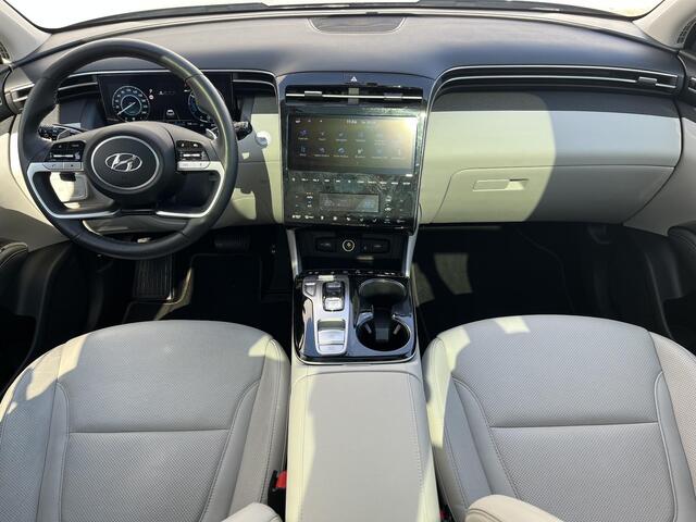 Hyundai TUCSON 1.6 T-GDI HEV 230pk Premium Sky Automaat / Trekgewicht 1.650 kg / Stuur- en stoelverwarming en verkoeling / Panoramadak / 360-graden camera / Keyless entry / Apple Carplay Android / Navigatie /