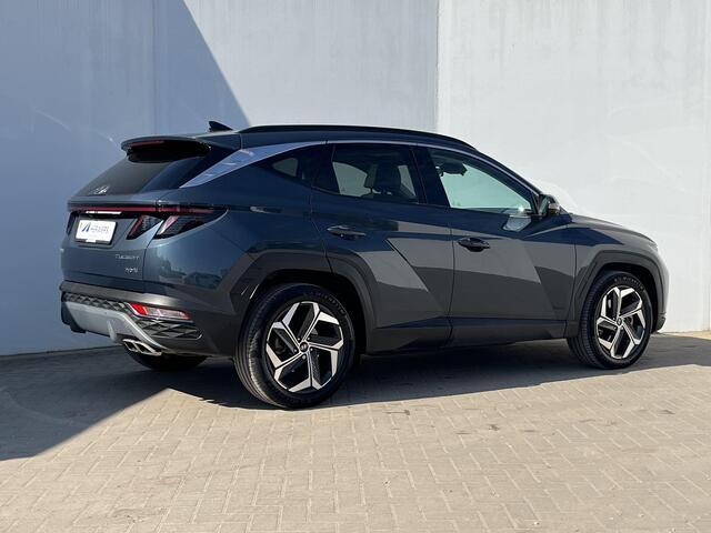 Hyundai TUCSON 1.6 T-GDI HEV 230pk Premium Sky Automaat / Trekgewicht 1.650 kg / Stuur- en stoelverwarming en verkoeling / Panoramadak / 360-graden camera / Keyless entry / Apple Carplay Android / Navigatie /