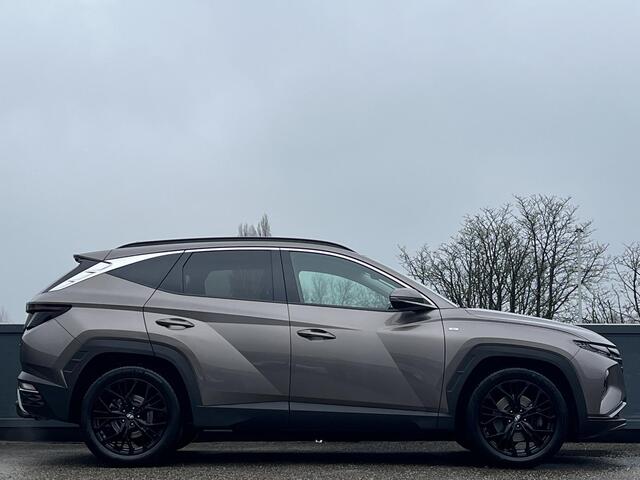Hyundai TUCSON 1.6 T-GDI 150 PK MHEV Comfort | Trekhaak | Lederen bekleding | 19'' Lichtmetalen velgen | Ingebouwde navigatiesysteem |