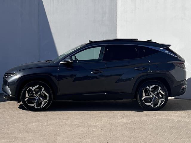 Hyundai TUCSON 1.6 T-GDI HEV 230pk Premium Sky Automaat / Trekgewicht 1.650 kg / Schuif-kanteldak / Leder / Elektrische klep en stoelen / Adaptieve Cruise Control / Leder / Camera 360° /