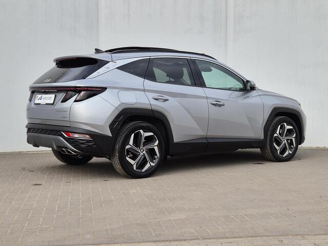 Hyundai TUCSON 1.6 T-GDI PHEV 265pk Premium Sky 4WD Automaat / Glazen schuif- en kanteldak / Adaptief cruise control / Stuur-, en Stoelverwarming / Stoelventilatie / Apple Carplay Android Auto / Rondomzicht camera / Elektrische achterklep /