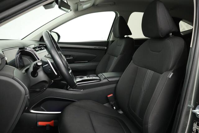 Hyundai TUCSON 1.6 T-GDI HEV Comfort Smart | Trekhaak | Stoel & stuurverwarming | Adaptive cruise | Carplay | Camera | Navigatie | Keyless