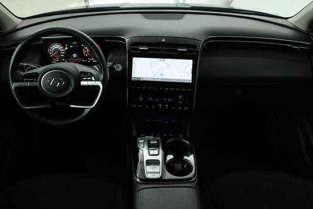 Hyundai TUCSON 1.6 T-GDI HEV Comfort Smart | Trekhaak | Stoel & stuurverwarming | Adaptive cruise | Carplay | Camera | Navigatie | Keyless